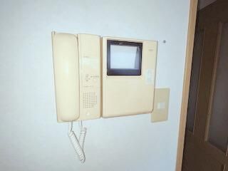 �y�Z�L�����e�B�z�@